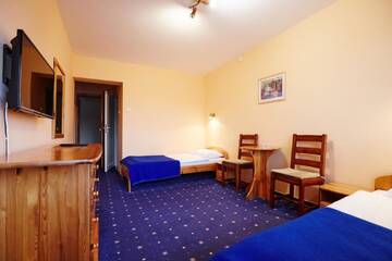 Фото номера Двухместный номер с 1 кроватью Отель Hotel Kozioł г. Kolno 5