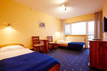 Фото номера Двухместный номер с 1 кроватью Отель Hotel Kozioł г. Kolno 6